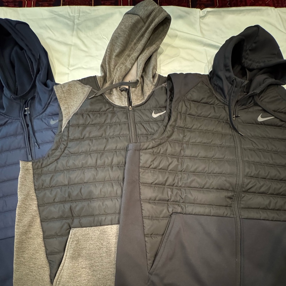 Nike black Hooded hybrid vests  $40